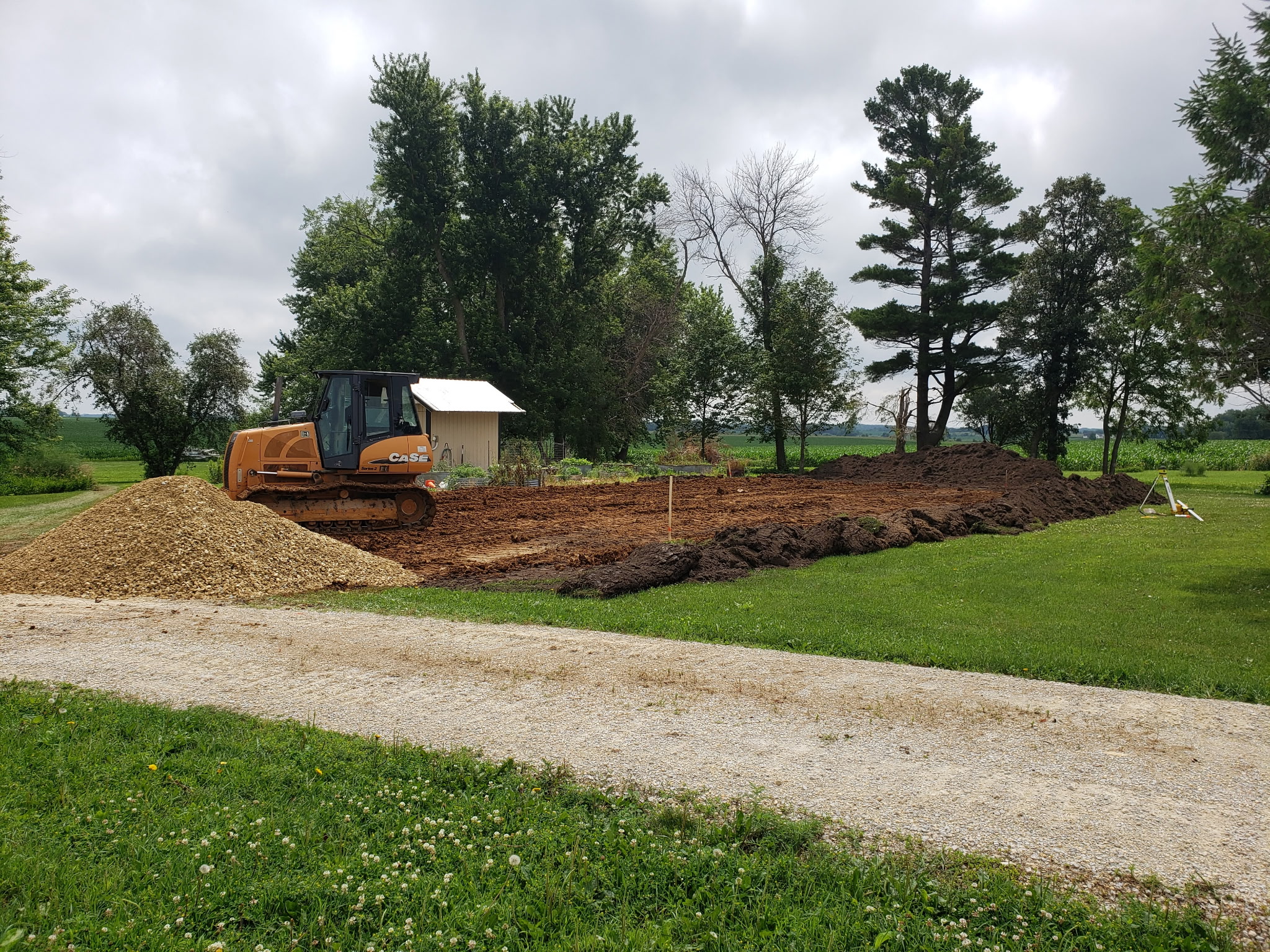 Residential excavation project with bulldozer preparing a construction site