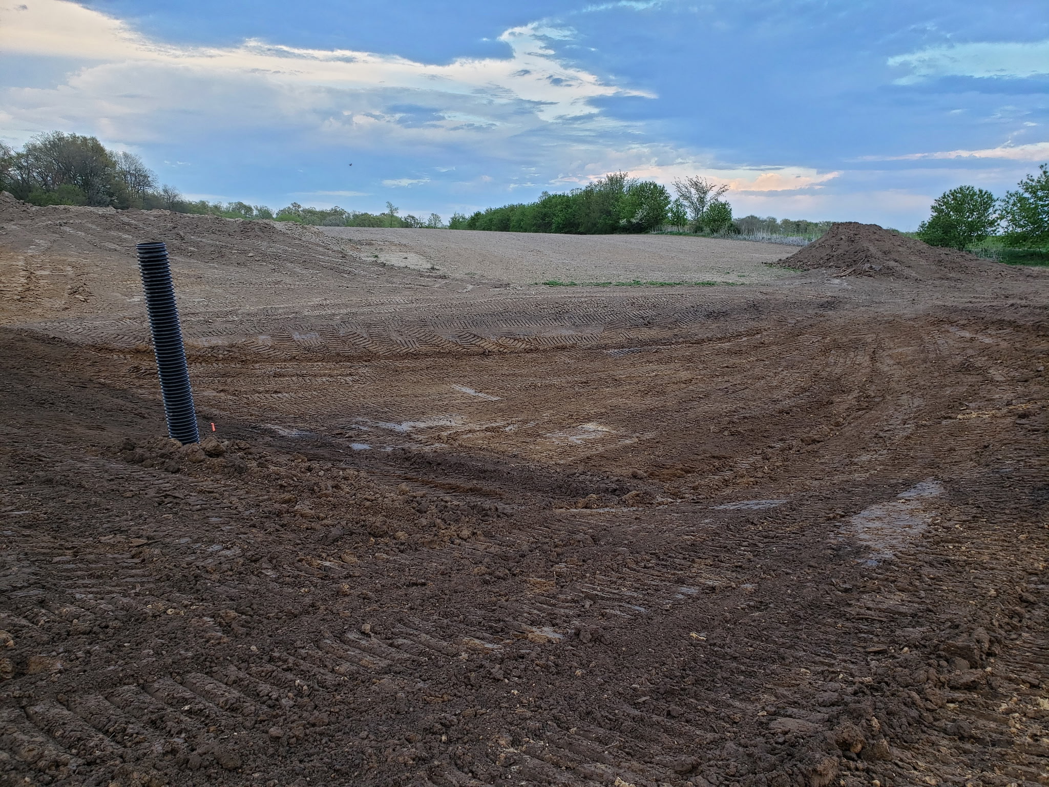 Before: Initial grading work for the stormwater retention area